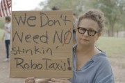 梦见搏斗特斯拉在得州奥斯汀遭遇抗议活动：反对马斯克Robotaxi计划